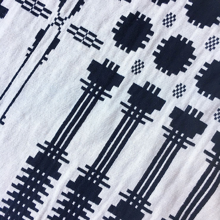 textile swatch of natural coverlet