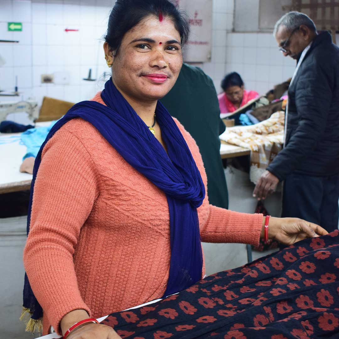 team in India doing quality control on bloom textile